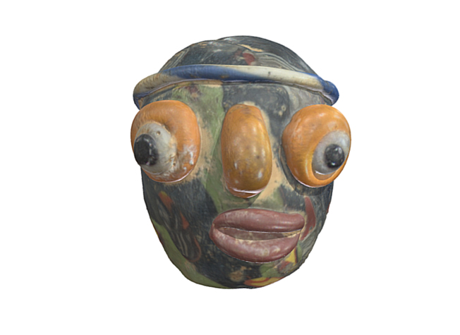 แก้วหลากสี (polychrome glass) รูปศีรษะบุคคล